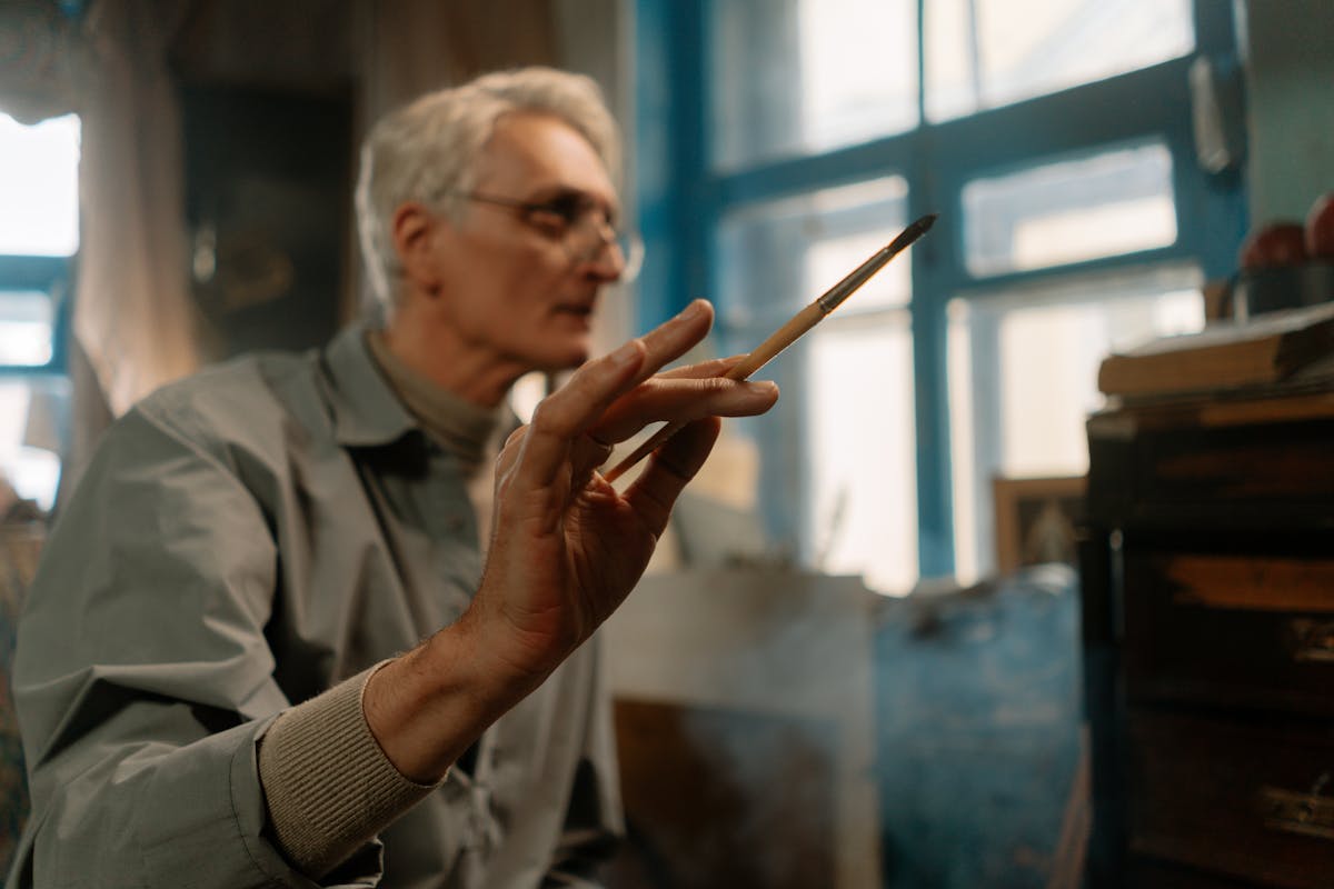 Man Holding A Paintbrush